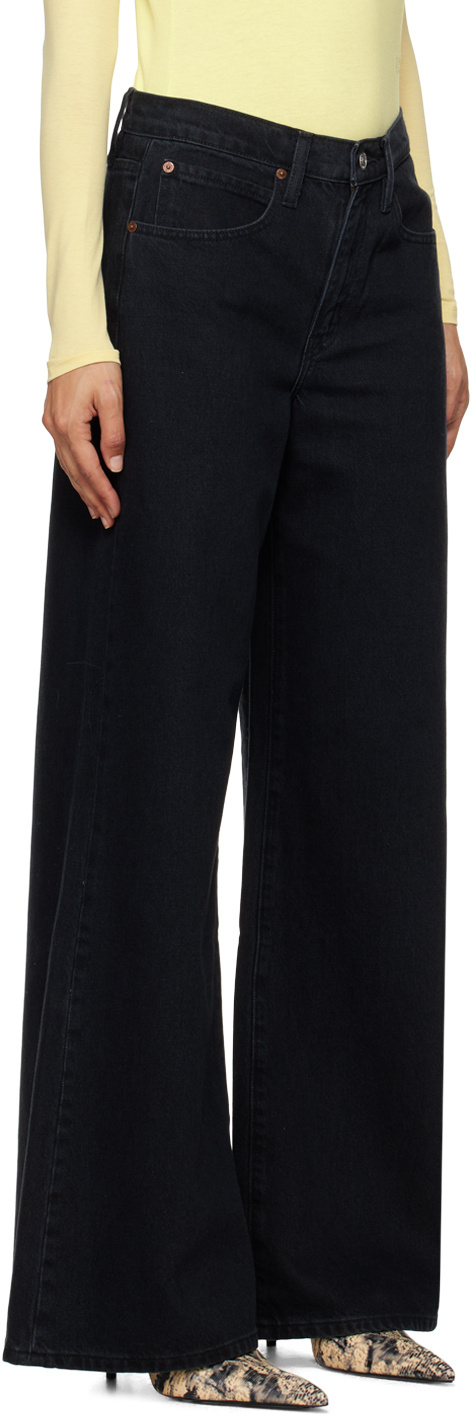 Shop Frame Easy Wide Flare Jeans In Black
