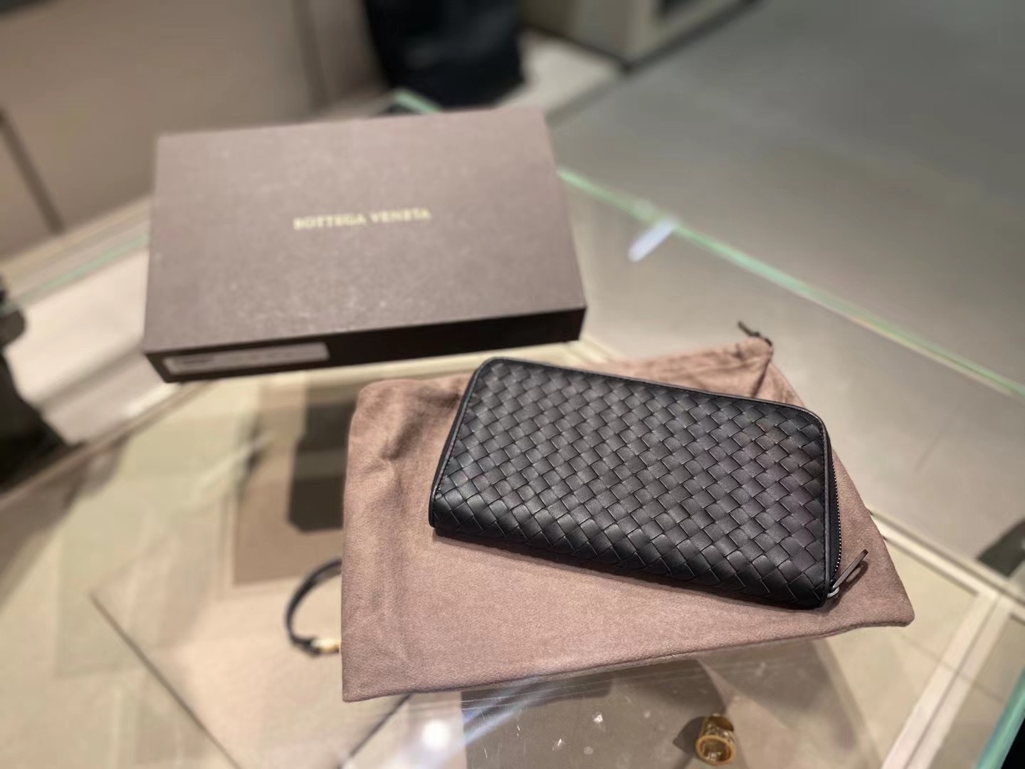 Bottega Veneta Intracciato Piccolo Woven Wrap-around Zipper Wallet In Black