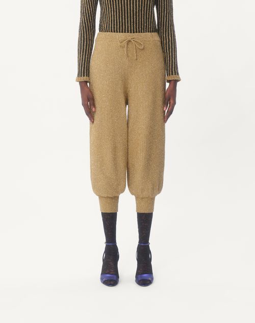 Shop Valentino Lurex Knit Trousers In Golden