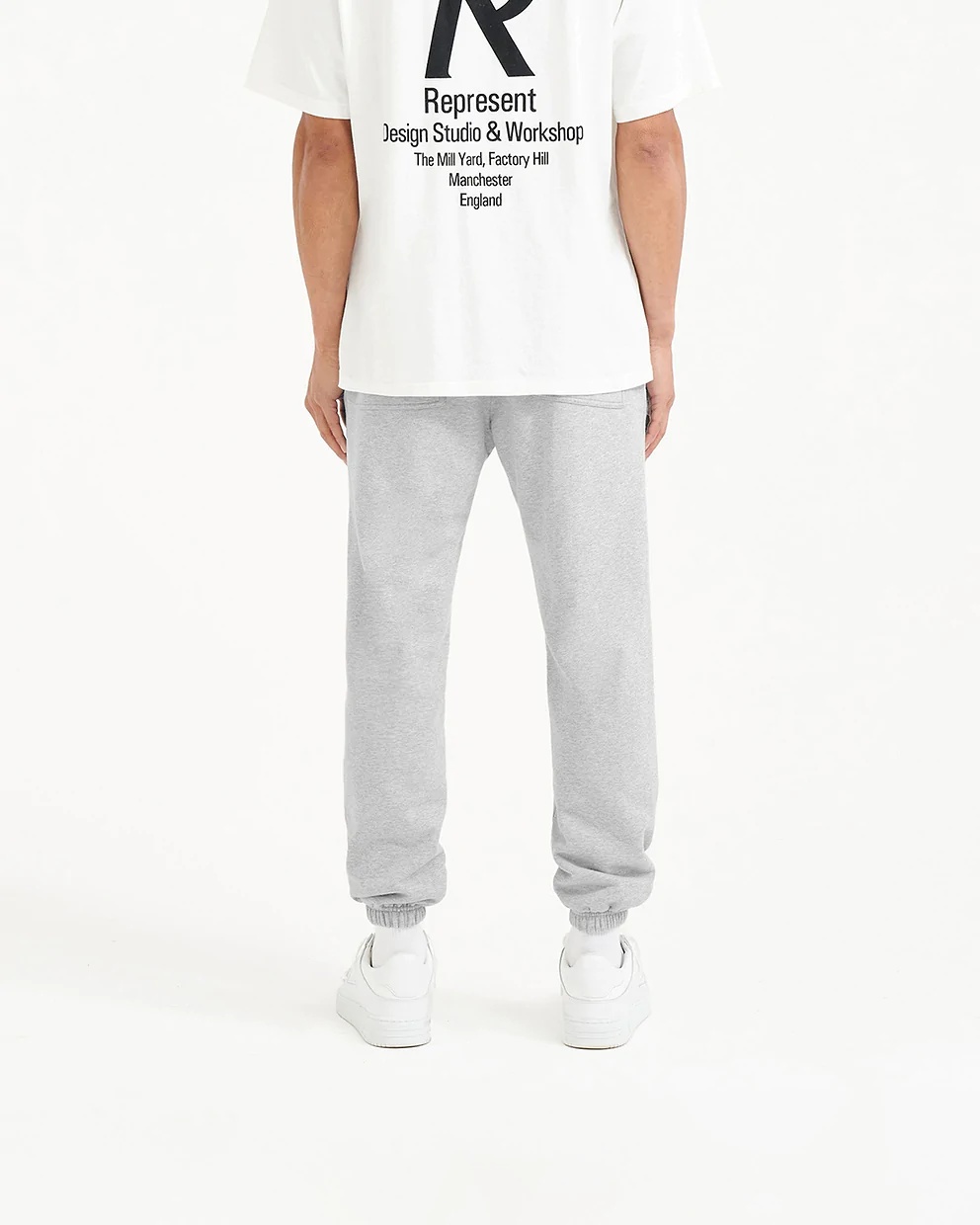 Represent Cotton Track Pants With Elastic Cuffs And Pockets In White