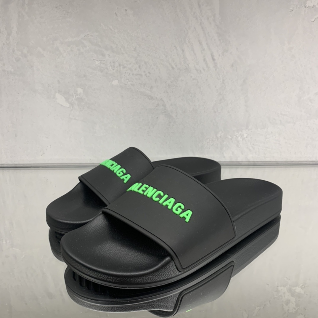 Balenciaga Embossed Logo Pool Slides In Black