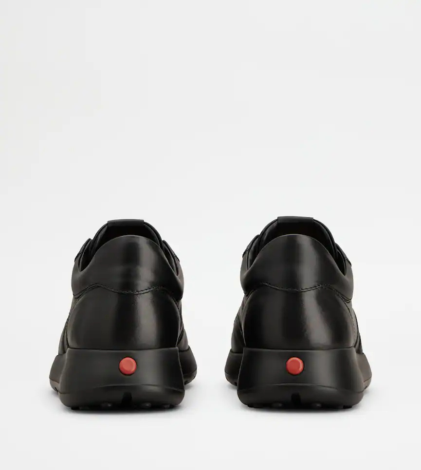 Tod's Streamlined Black Leather Sneakers With Padded Collar In Black