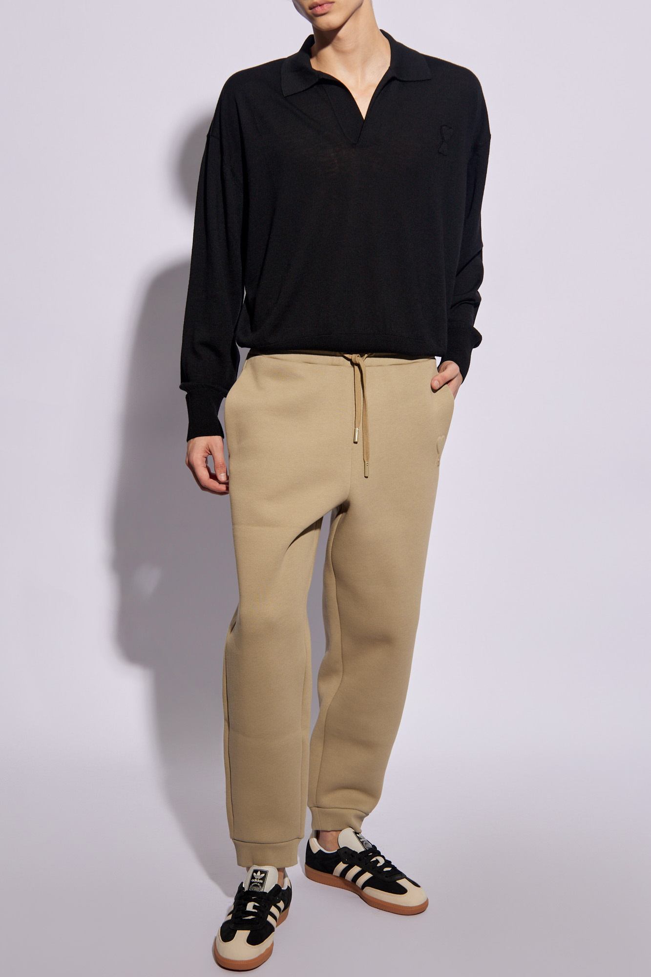 Shop Ami Alexandre Mattiussi Ami Logo Embossed Drawstring Track Pants In Nude