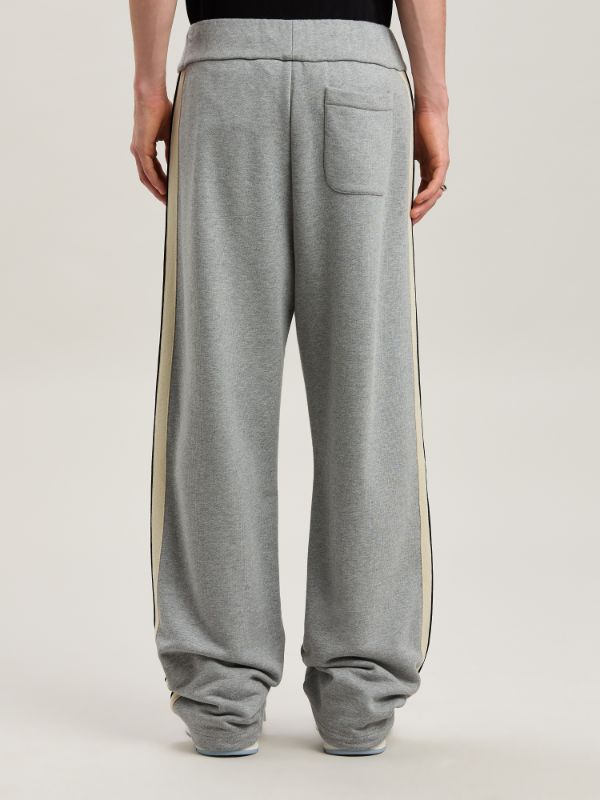 Palm Angels Curved Logo Printed Sweatpants In Gray