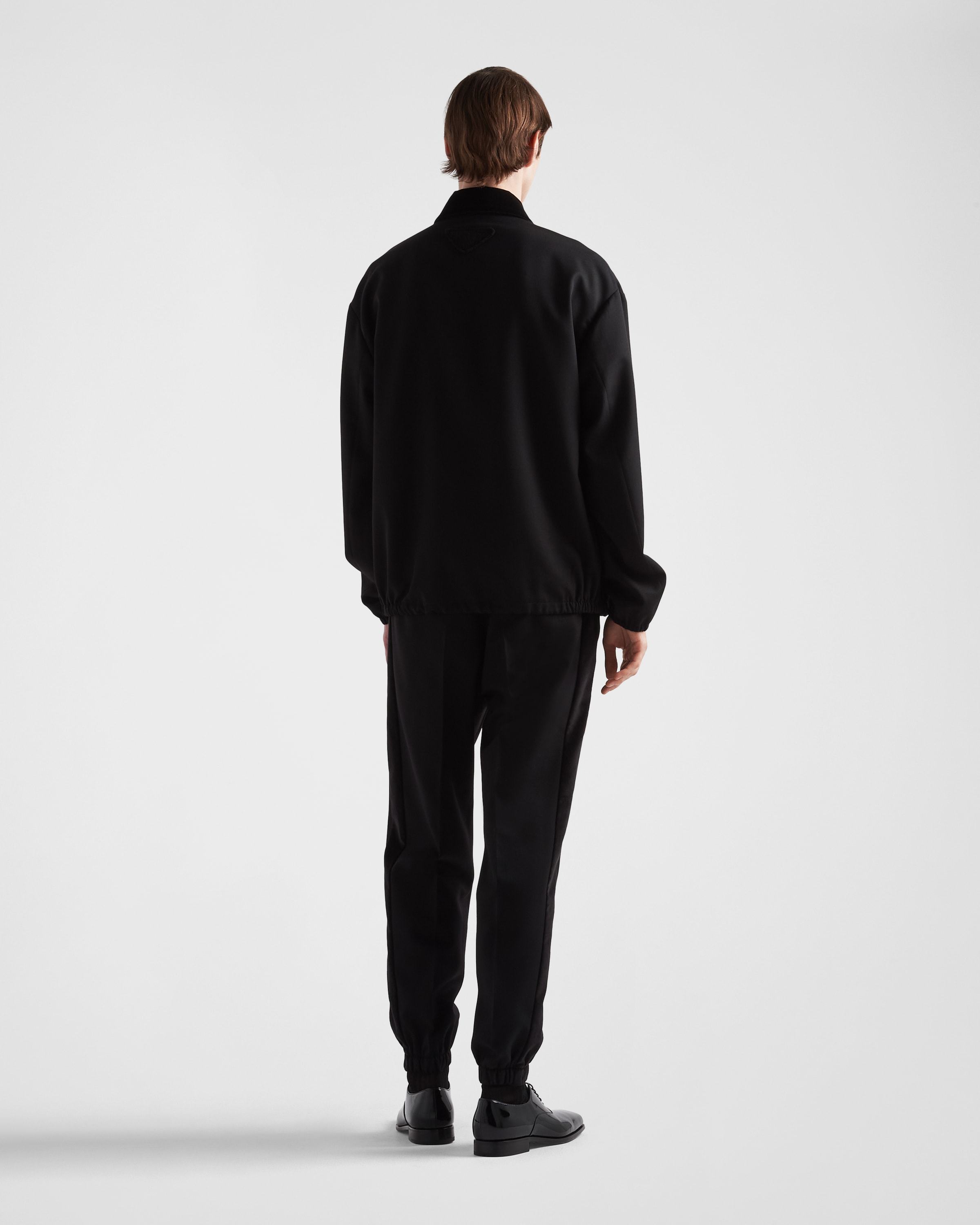 Prada Pressed-crease Velvet Tapered Trousers In Black