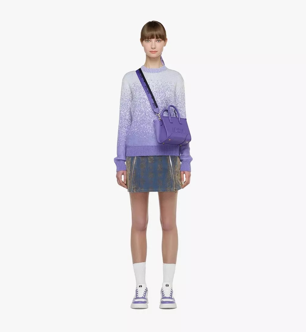 MCM LOGO-EMBOSSED LEATHER TOTE BAG