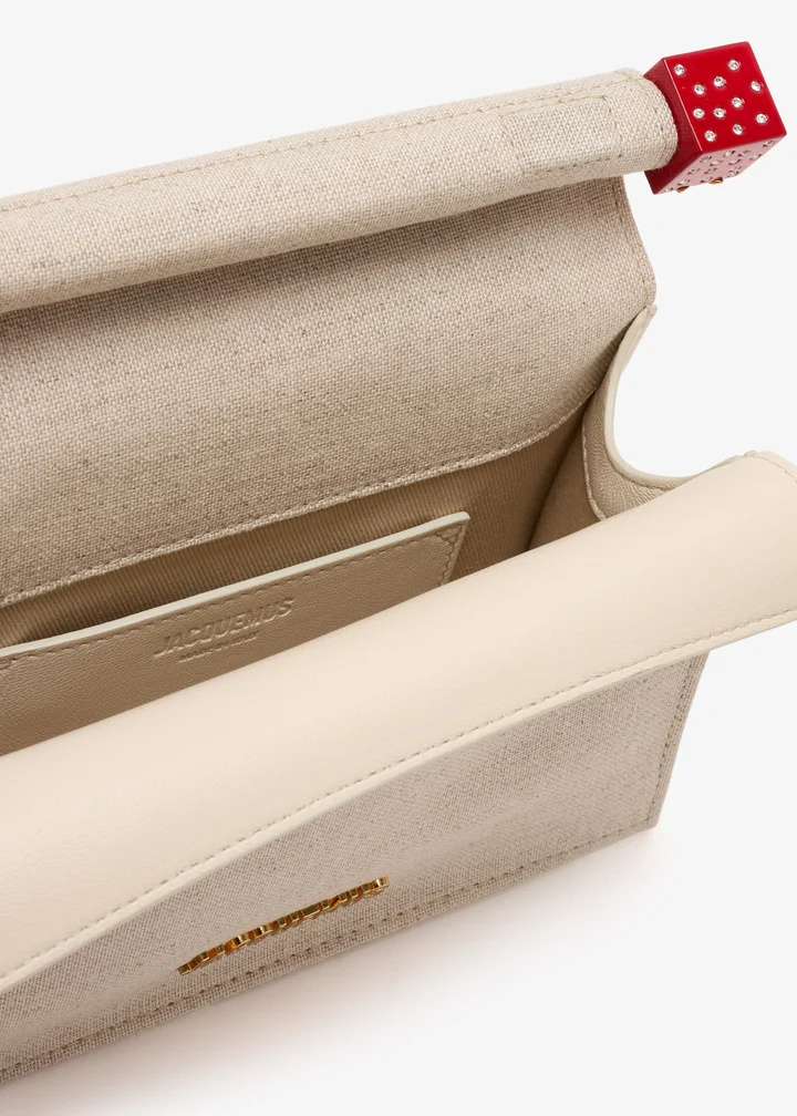 Jacquemus Pochette Small Embellished Leather-trimmed Canvas Clutch In Sand