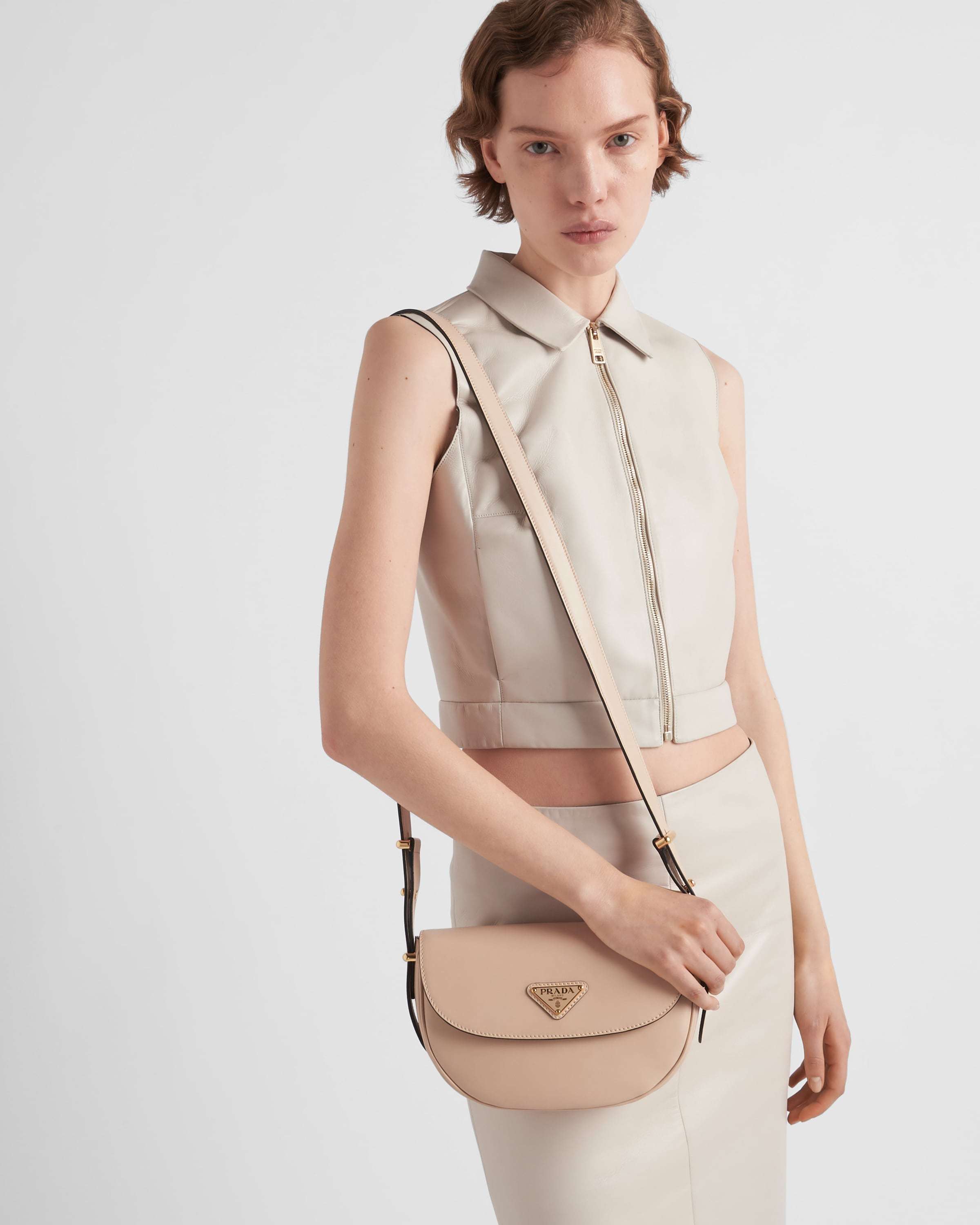 Prada Logo Plaque Foldover Small Shoulder Bag In Nude