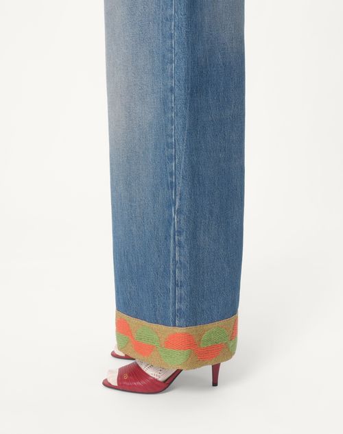 Valentino Garavani Light Blue Jeans With Logo Patch On The Back And Jacquard Cuffs In Denim Woman In Blue