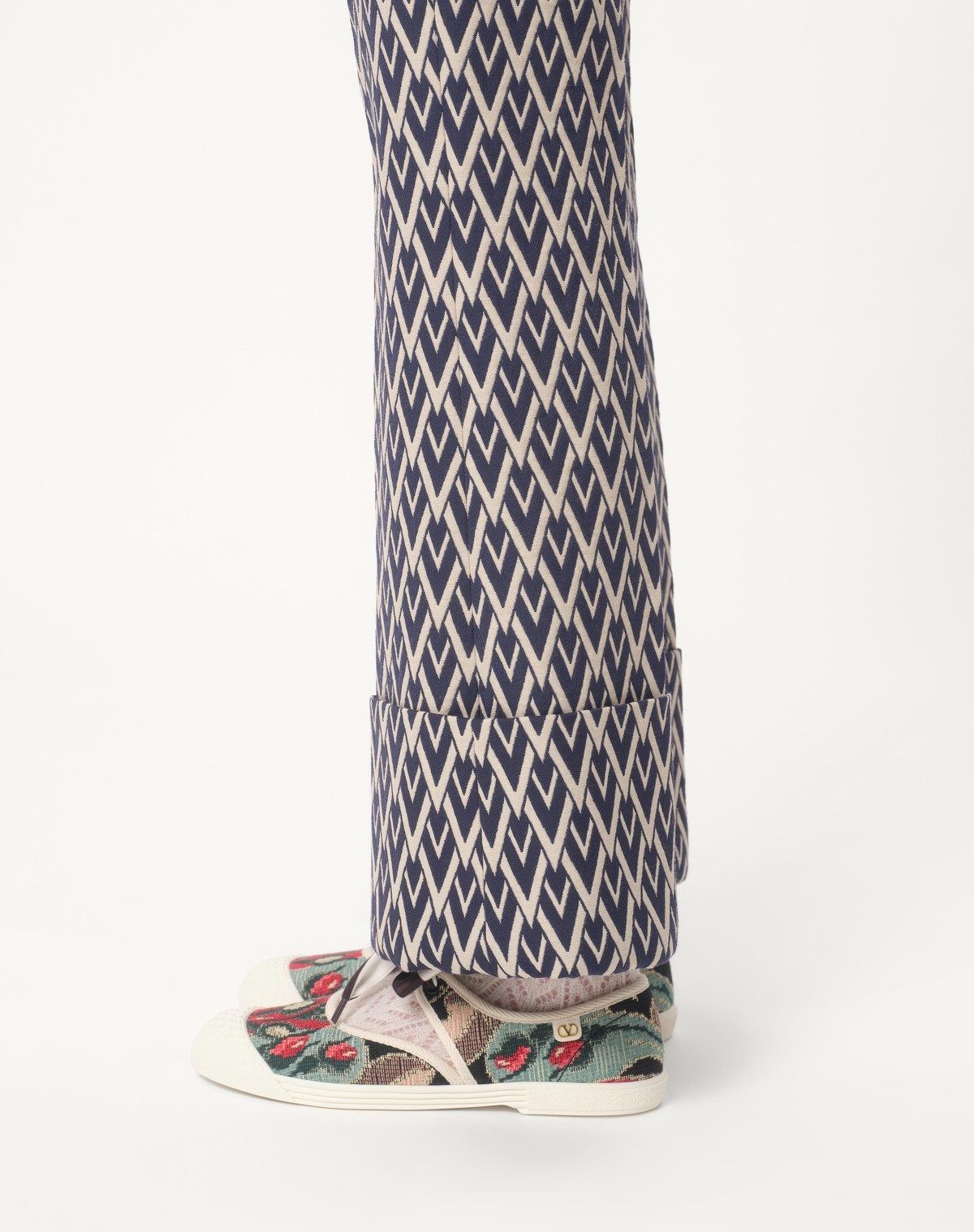 Valentino Geometric Pattern Cuffed Hem Trousers In Gray