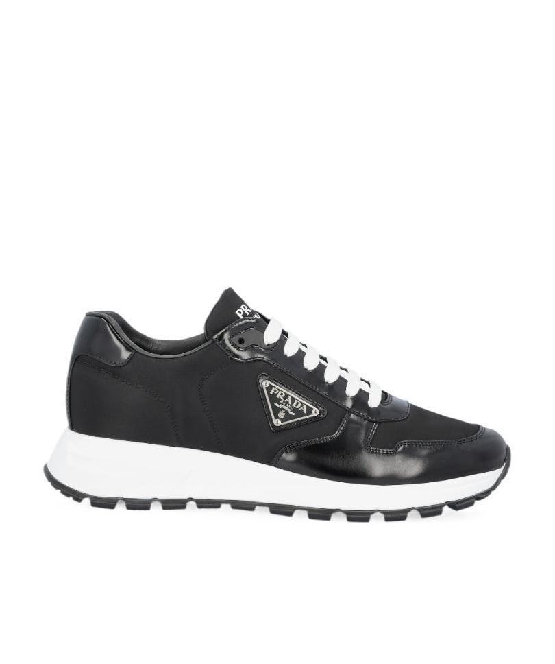 Shop Prada Logo-patch Low-top Sneakers In Black