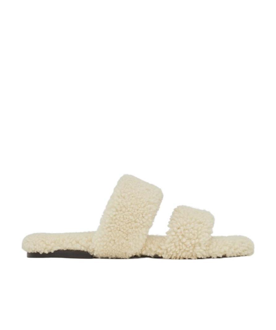 SAINT LAURENT BLEACH SLIDES IN SHEARLING