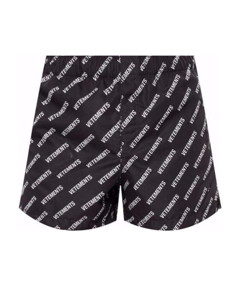 Vetements Logo Printed Beach Pants In Black