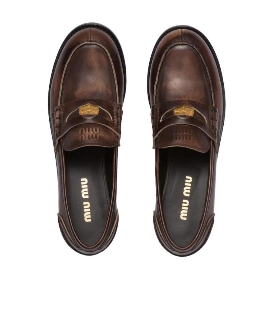 Miu Miu Logo Embossed Calf Leather Loafers In Black