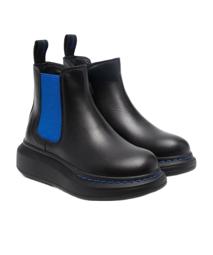 Alexander Mcqueen Thick-soled Jacketed Boots In Black