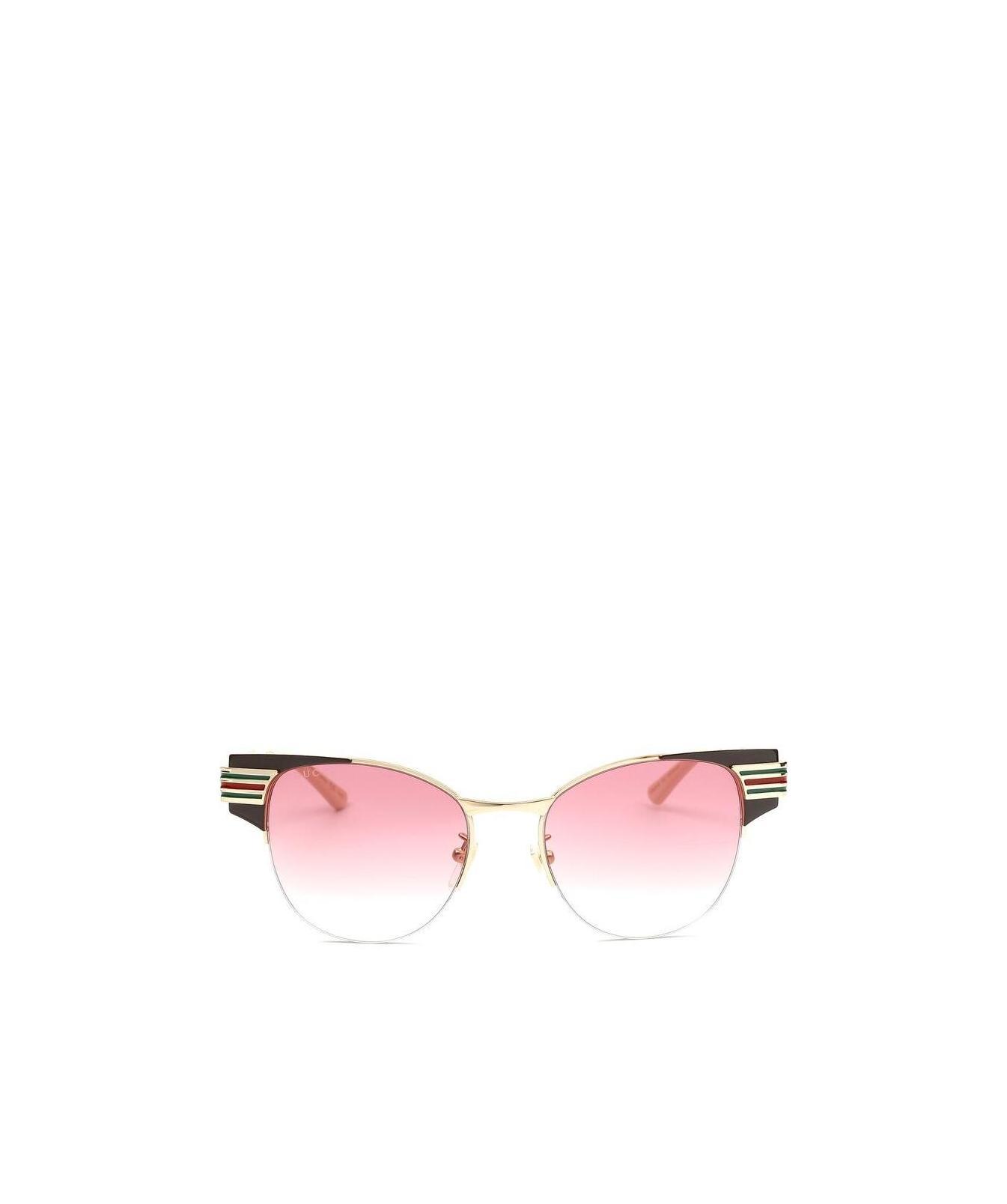 Gucci Cat's Eye Embossed Logo Sunglasses In Pink