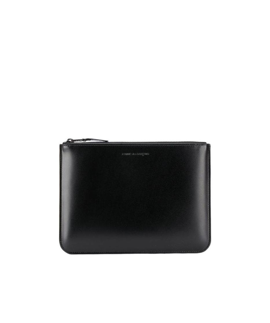 Comme Des Garçons Embossed Logo Wallet In Black