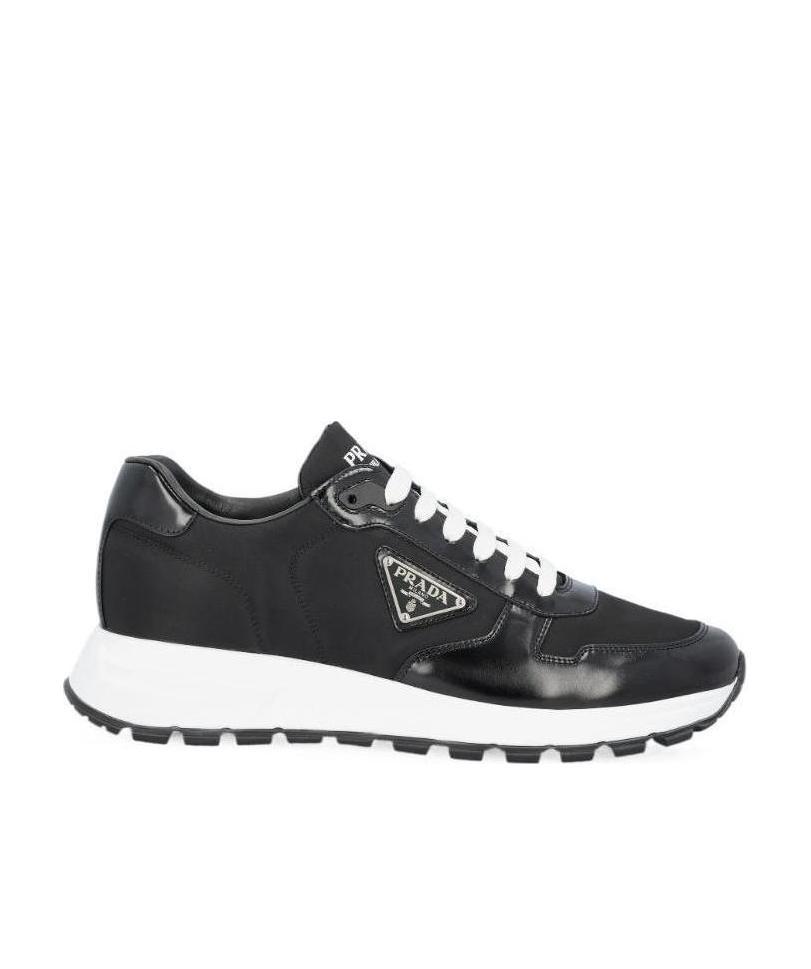 Shop Prada Logo Plaque Low-top Sneakers In Black