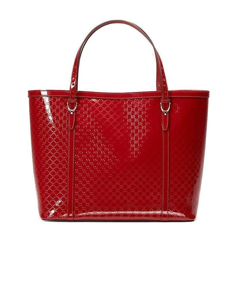 GUCCI EMBOSSED HANDBAG