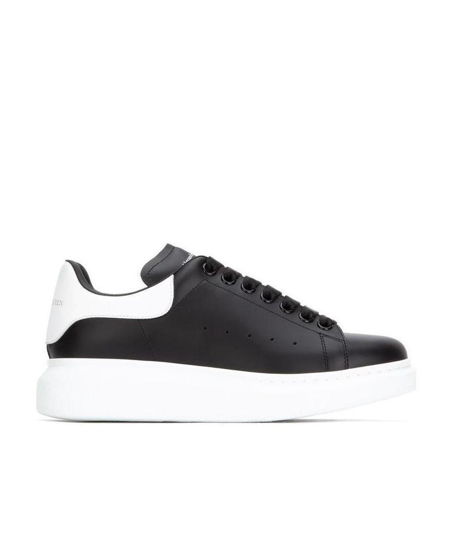 Alexander Mcqueen Exaggerated-sole Leather Sneakers In Black