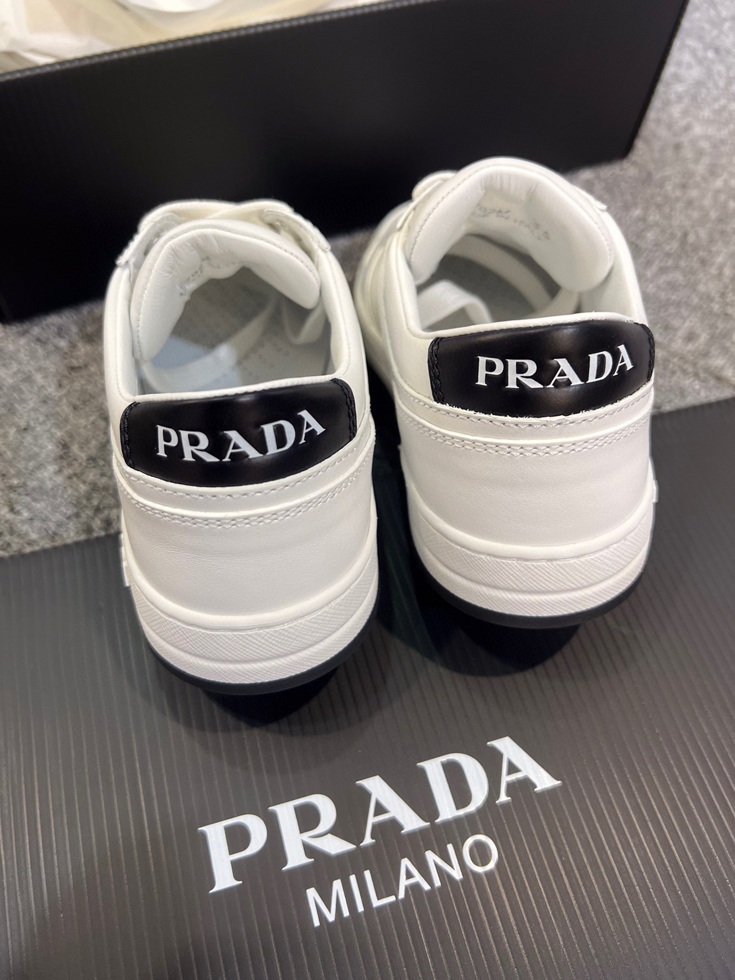 Prada Logo-plaque Leather Sneakers In White
