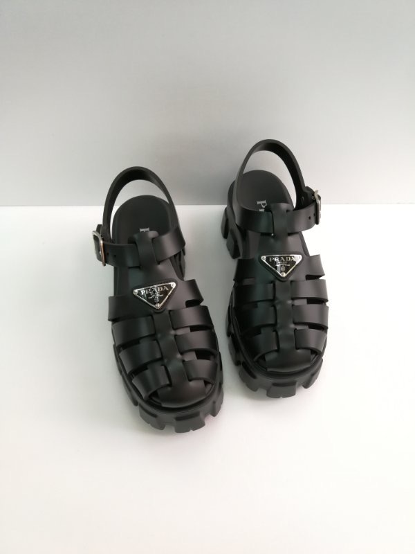 Shop Prada Foam Triangle-logo Sandals In Black