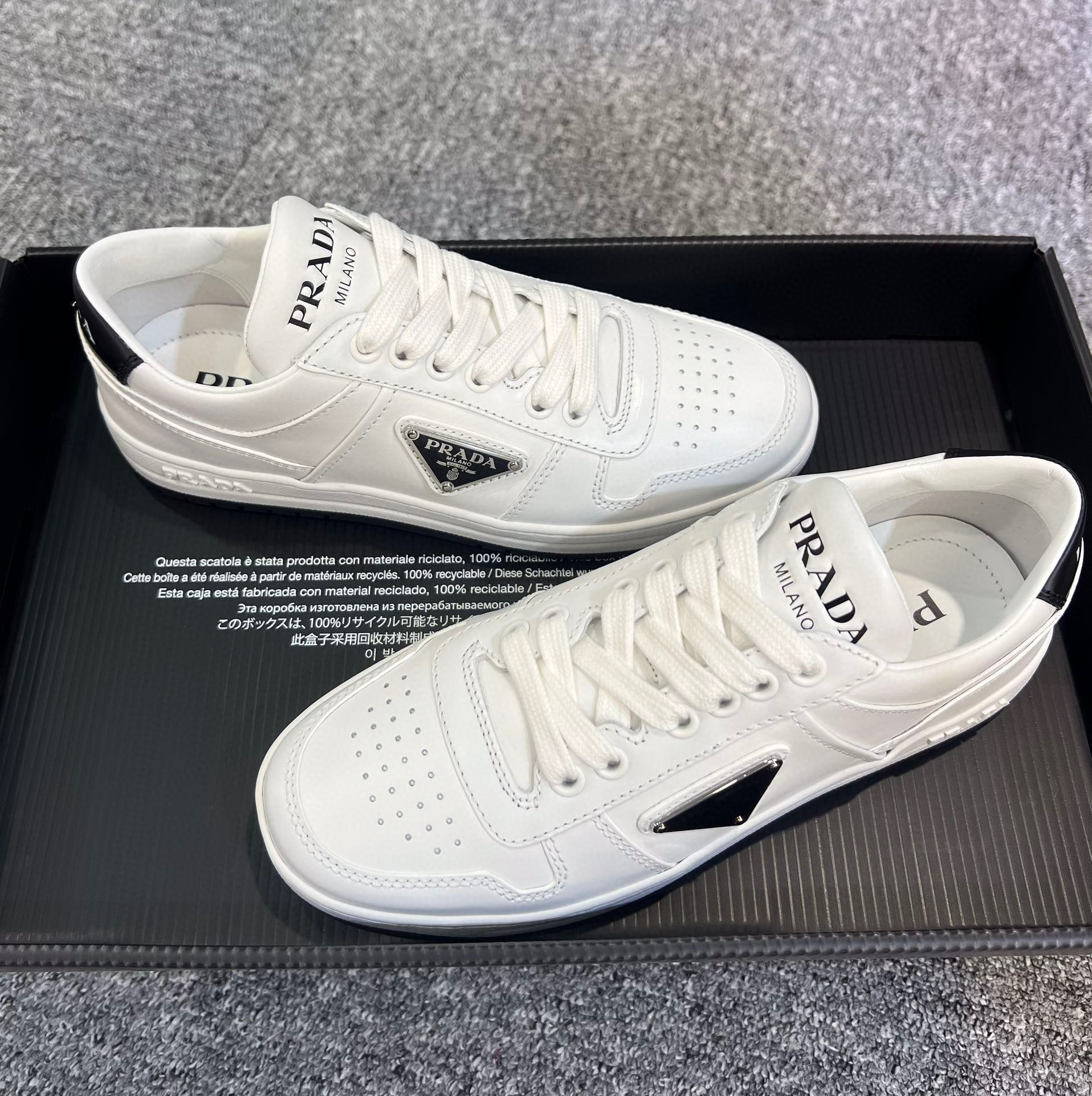 Prada Logo-plaque Leather Sneakers In White
