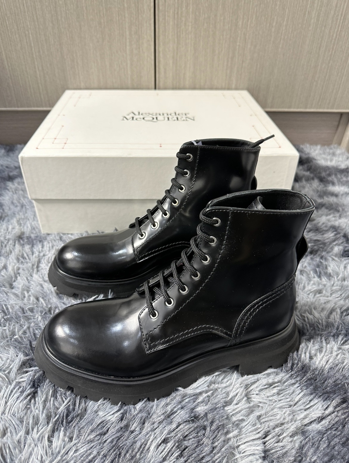 Alexander Mcqueen Wander Glossed-leather Exaggerated-sole Ankle Boots In Black